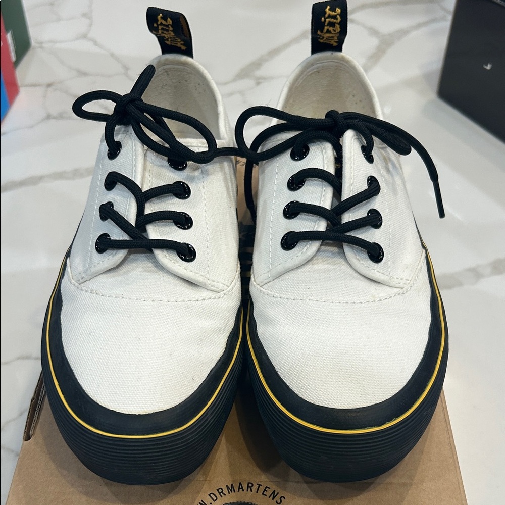 Dr. Martens  Jacy White Canvas Shoes with Black and Yellow Accents.  
SZ. 7